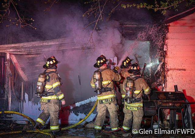 Fort Worth firefighters rescued two dogs from a Fort Worth house fire early Wednesday, March 11, officials said.